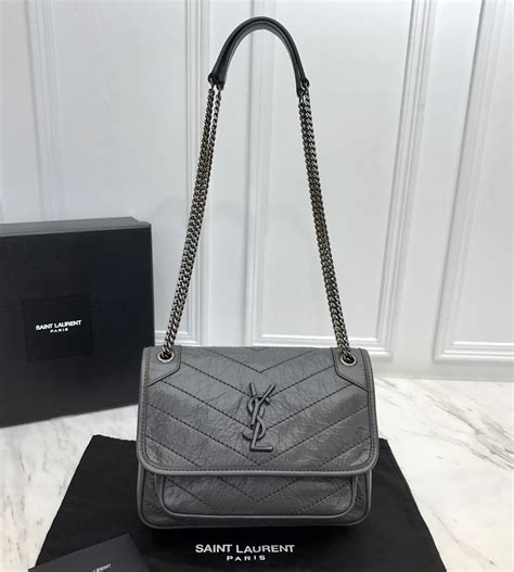 ysl purple handbag|yves Saint Laurent purse price.